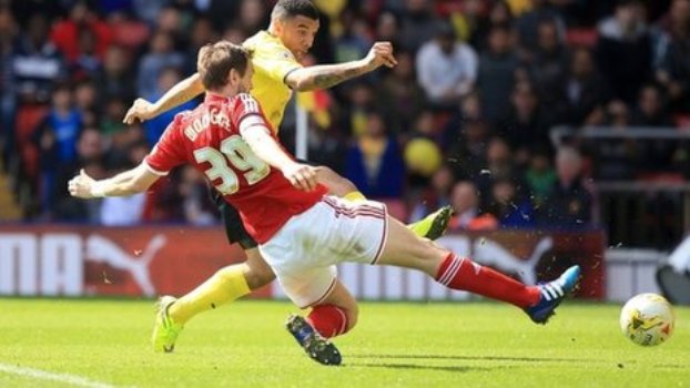 History maker Deeney knocks Boro off top spot