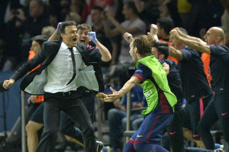 Enrique celebrates treble